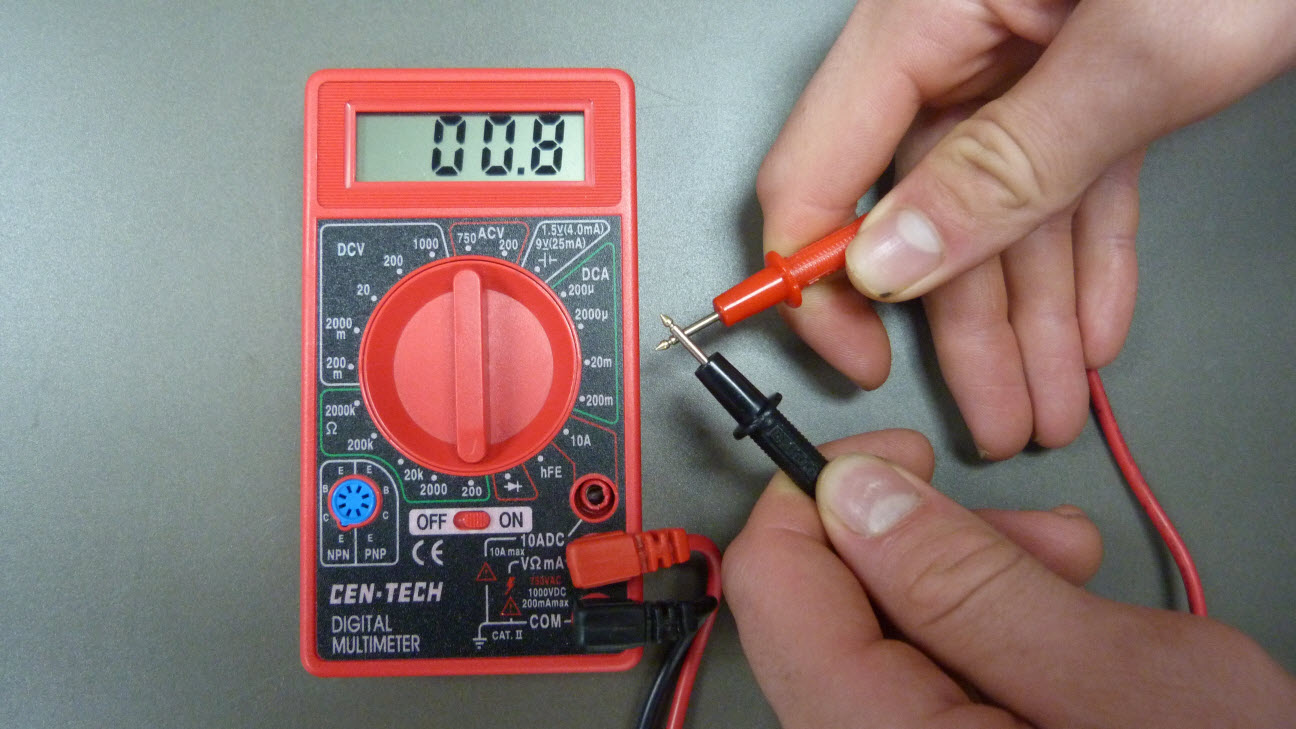 Cross red and black probes determine resistance