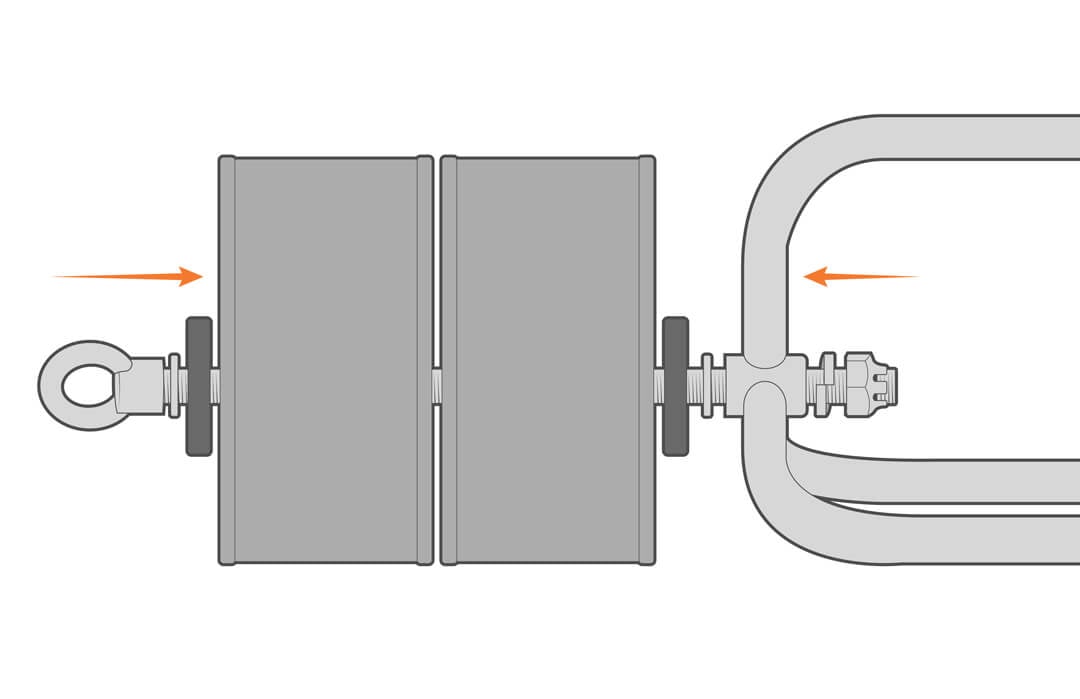 Two ballast weights are being secured on the bottom of a NexSens instrument cage.