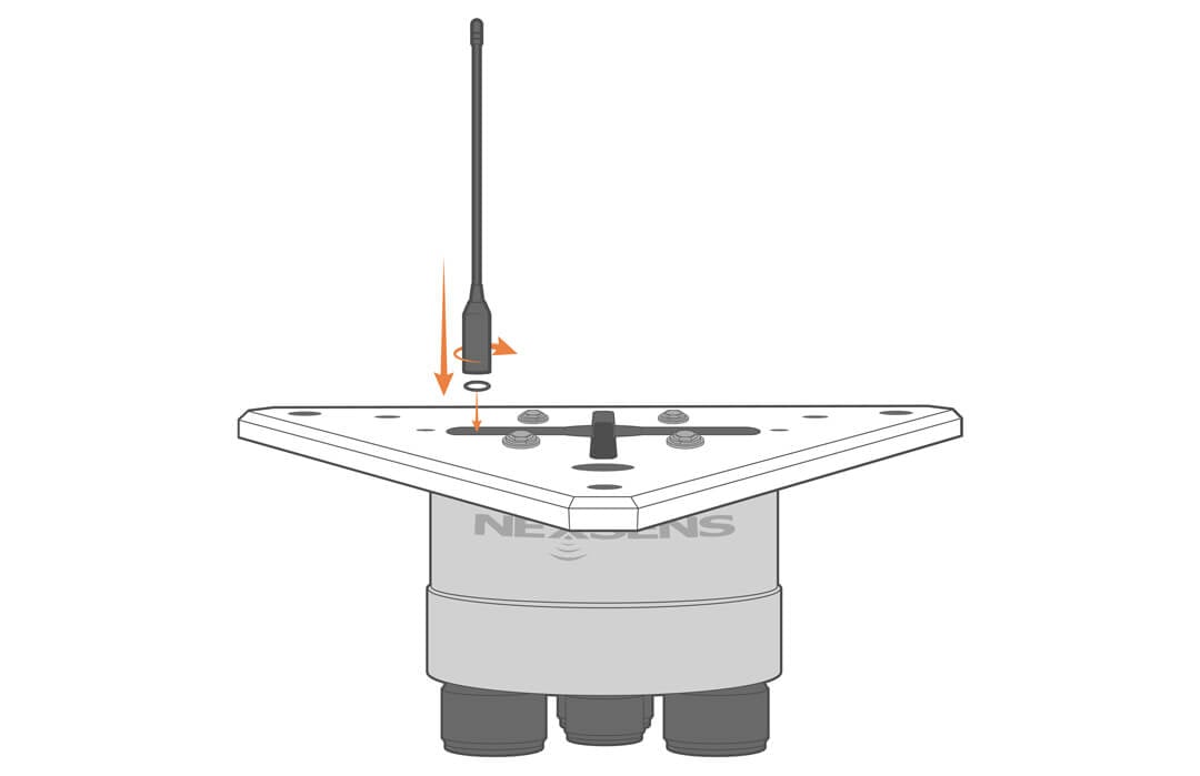 Screwing in the telemetry antenna on an X3 data logger.