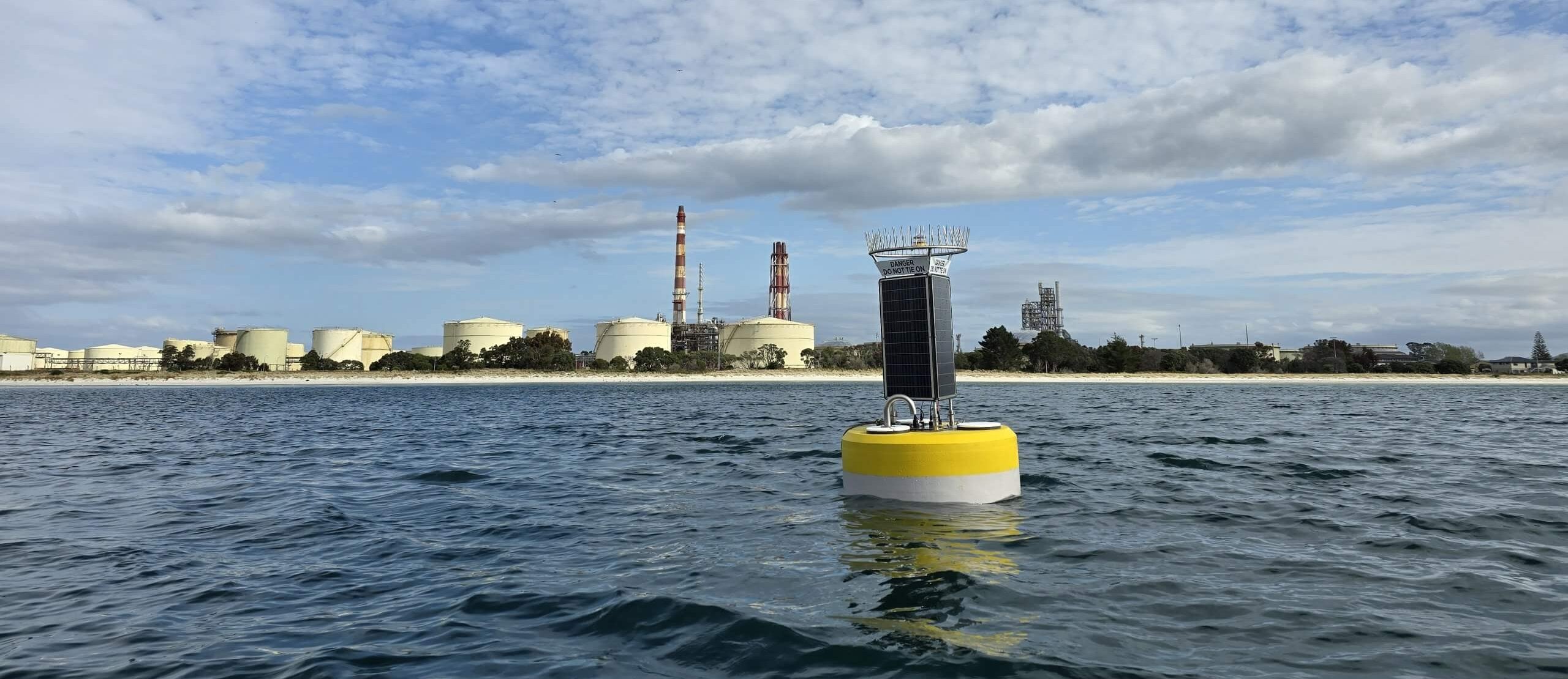 Buoys listening for marine mammals in Whangārei Harbor.