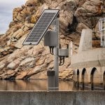Dissolved Oxygen monitoring system deployed near a hydroelectric dam. The system include a NexSens X3 data logger, solar power pack, and a multiparameter water quality sonde.